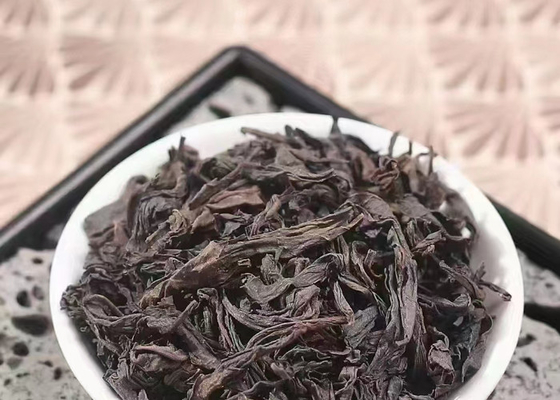 ۲۰۲۲ بهار چای تازه چای سیاه کوه ووئی چنگ شان گل های کوچک میوه دار چای وحشی کوهستان بلند تونگمو گوان سان