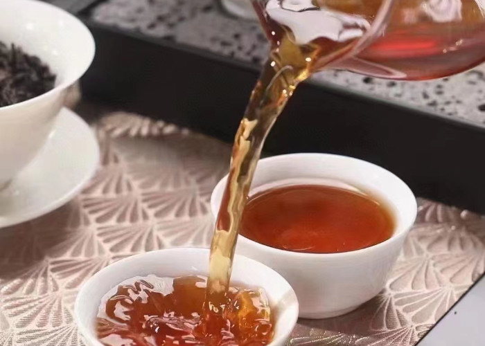 ۲۰۲۲ بهار چای تازه چای سیاه کوه ووئی چنگ شان گل های کوچک میوه دار چای وحشی کوهستان بلند تونگمو گوان سان